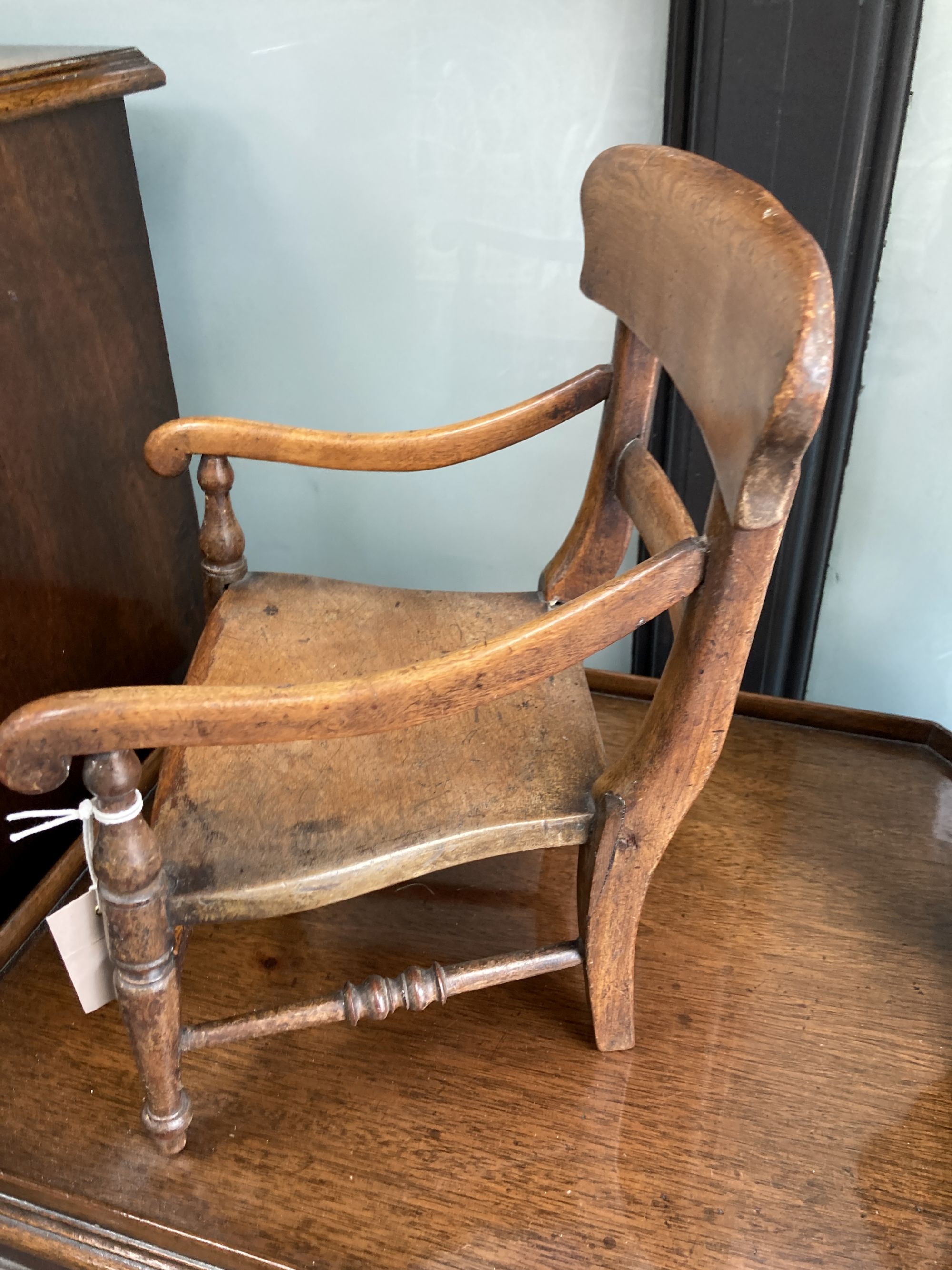 A Victorian mahogany apprentice elbow chair, width 26cm, depth 22cm, height 35cm